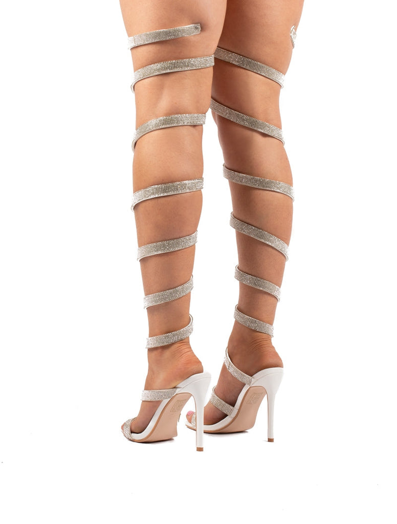 Thigh high clearance wrap heels