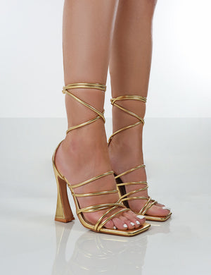 Gold lace up store heels