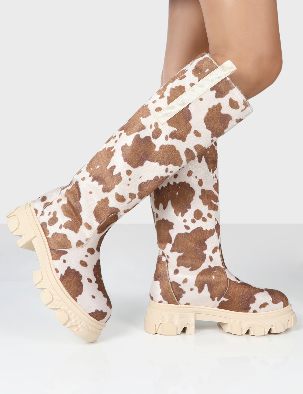 Amber x Public Desire Genius Cow Print Knee High Chunky Sole