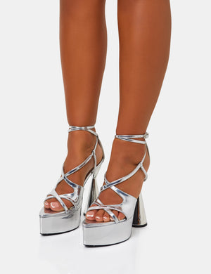 Tina Iridescent Silver Mirror Asymmetric Cut Out Strappy Ankle Platform Flared Block Heel